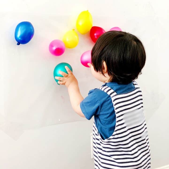 Balloon Sticky Wall Sensory Activity For Babies And Toddlers Hello Wonderful