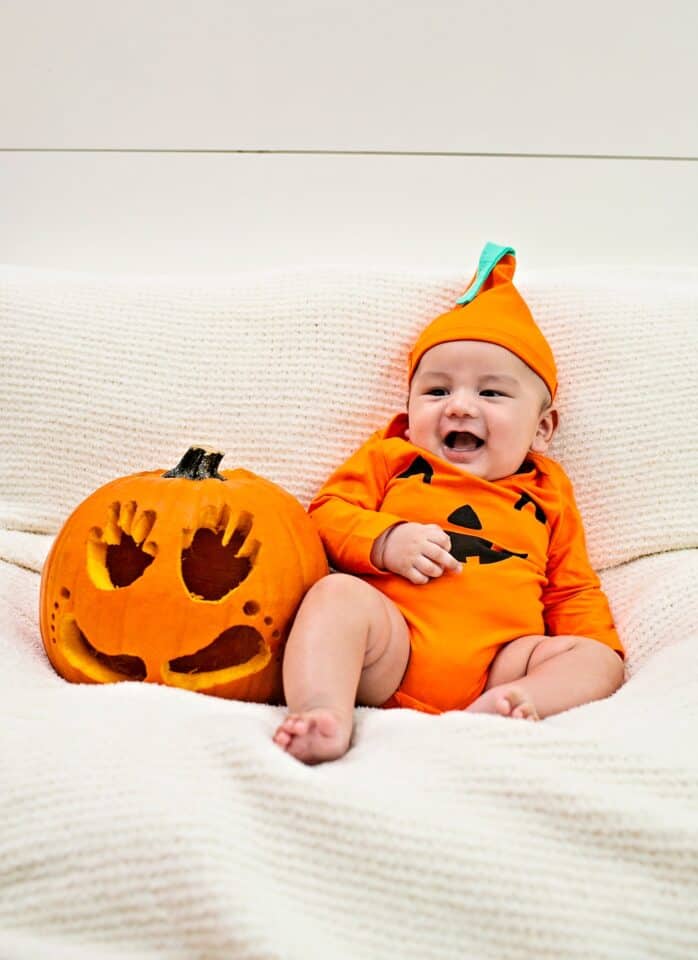 This Baby Pumpkin Handprint Art Celebrates Baby's First Halloween!